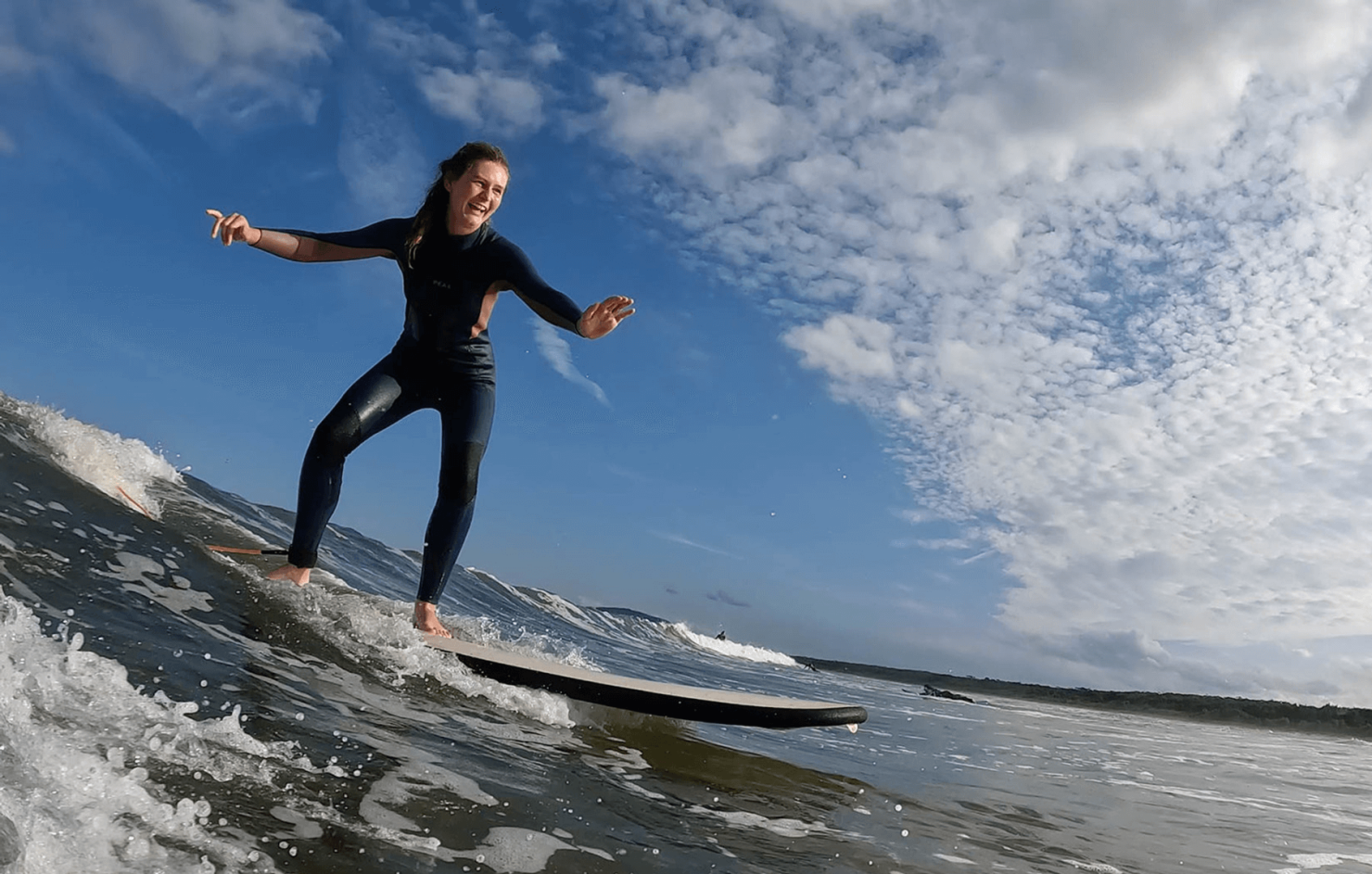 Group traveller surfing at surf camp in Australia