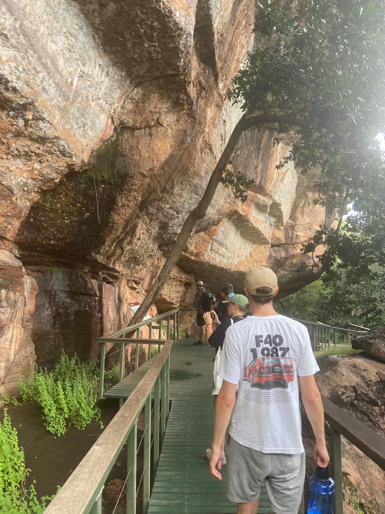 Traveller walking along the Kakado rock edge