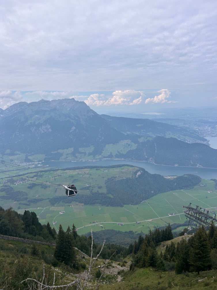 cable car going up mountain in Switzerland