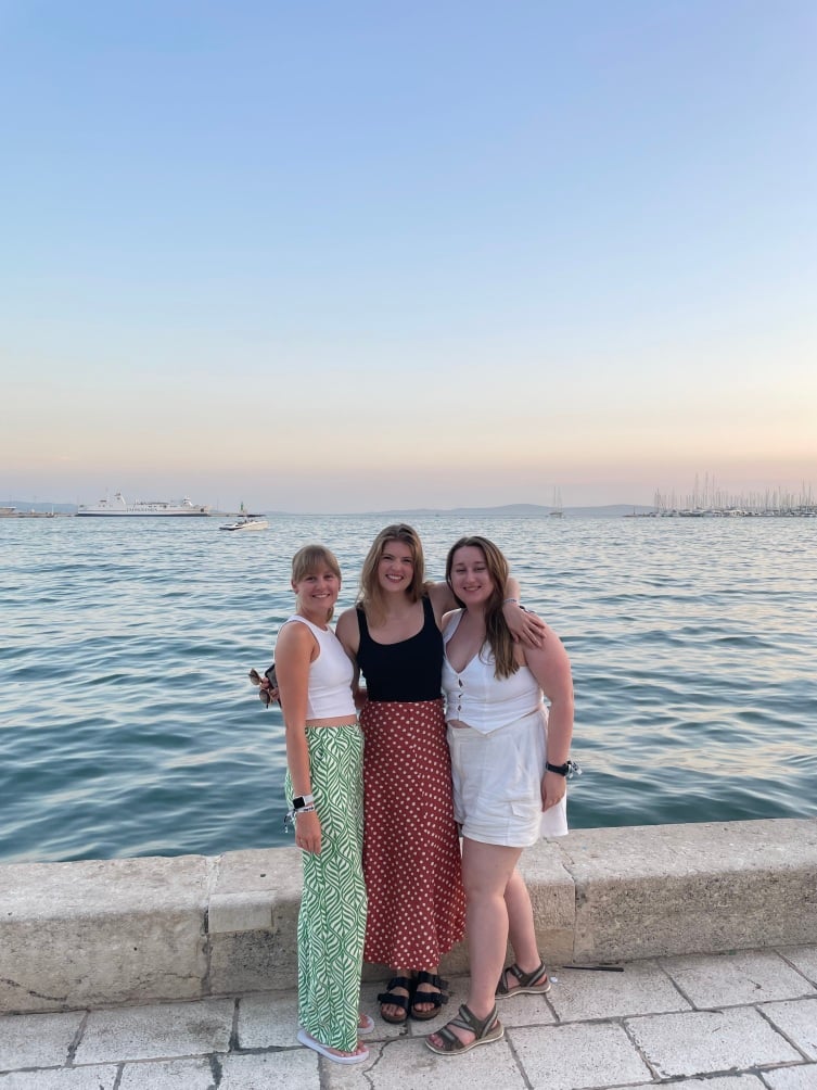 Travellers in front of ocean view in Croatia