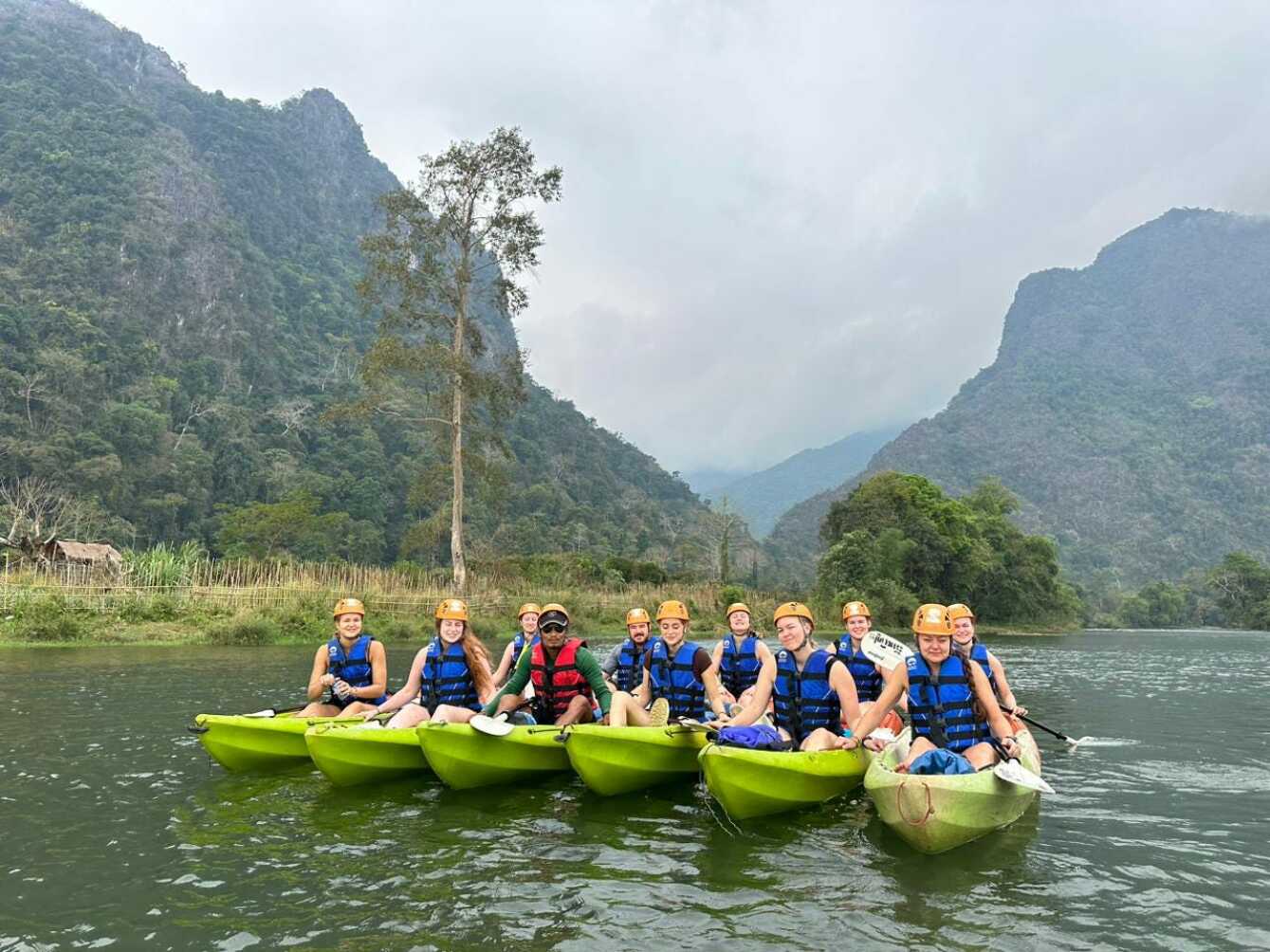 Group of travellers kayaking