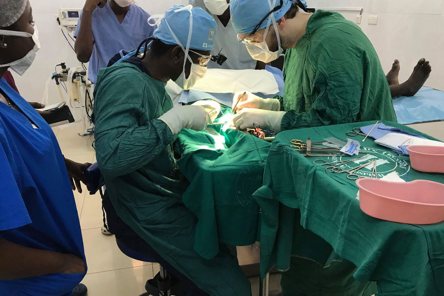 people performing an operation