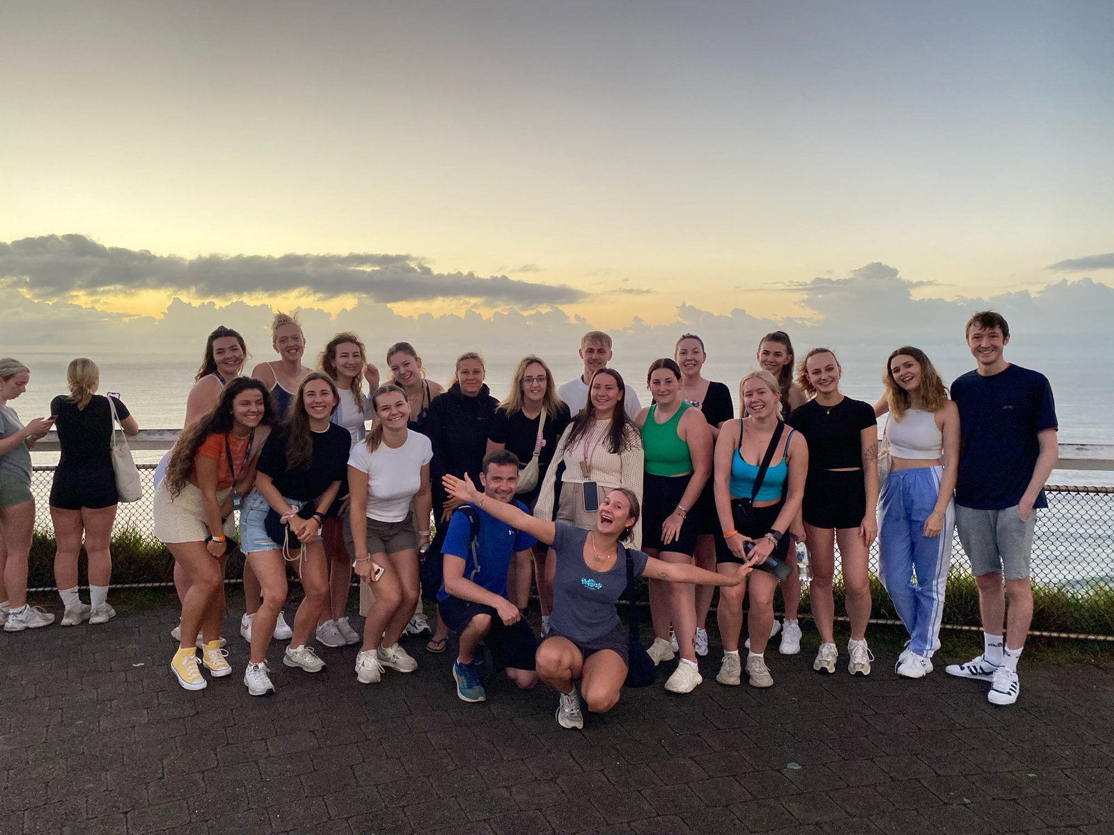 group of travellers in Byron Bay taking a photo together