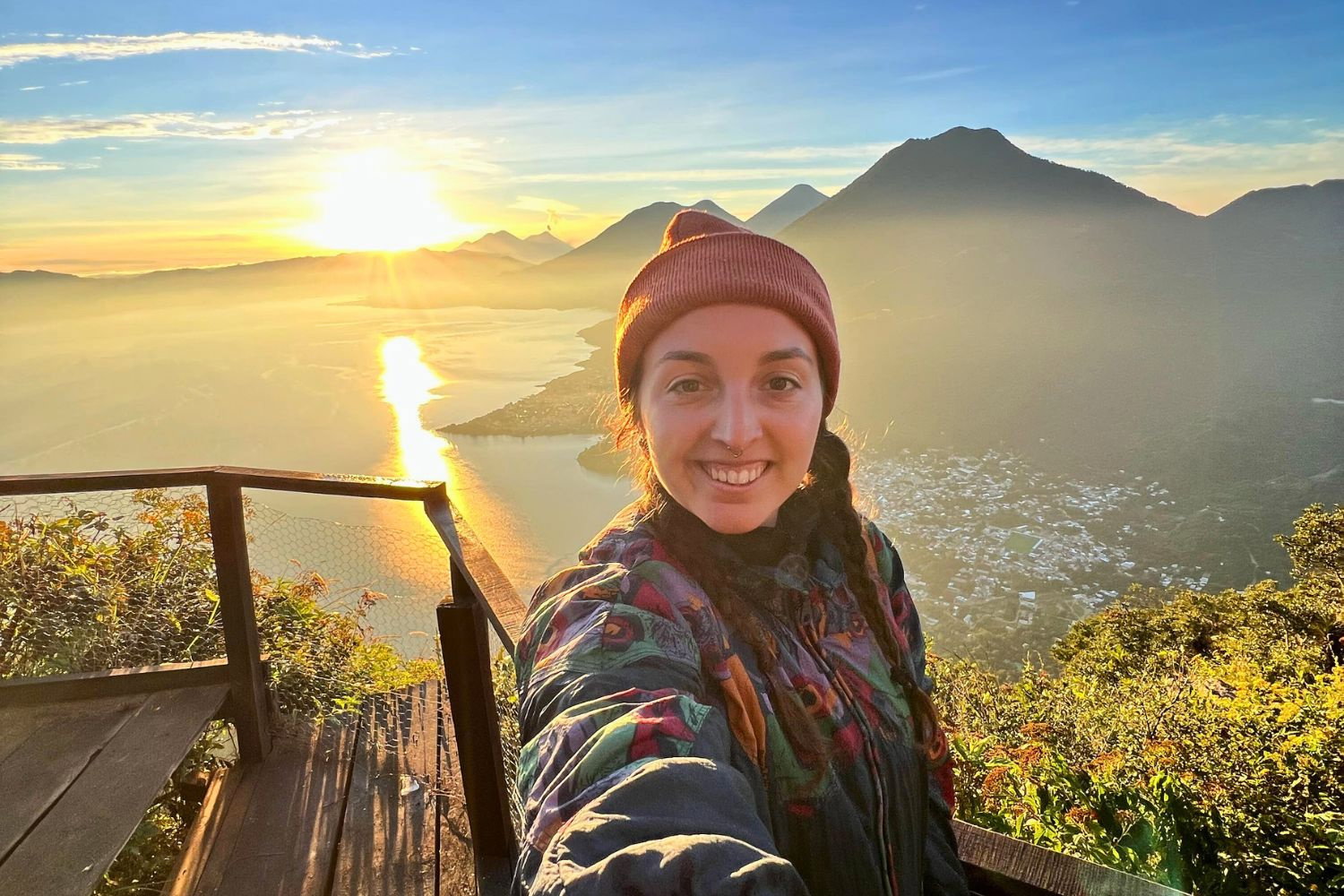 Traveller taking a sunrise selfie near Lake Atitlán in Guatemala