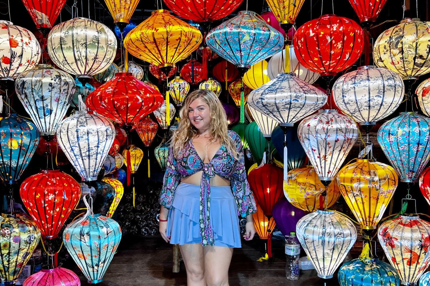 Traveller posing by lanterns in Vietnam