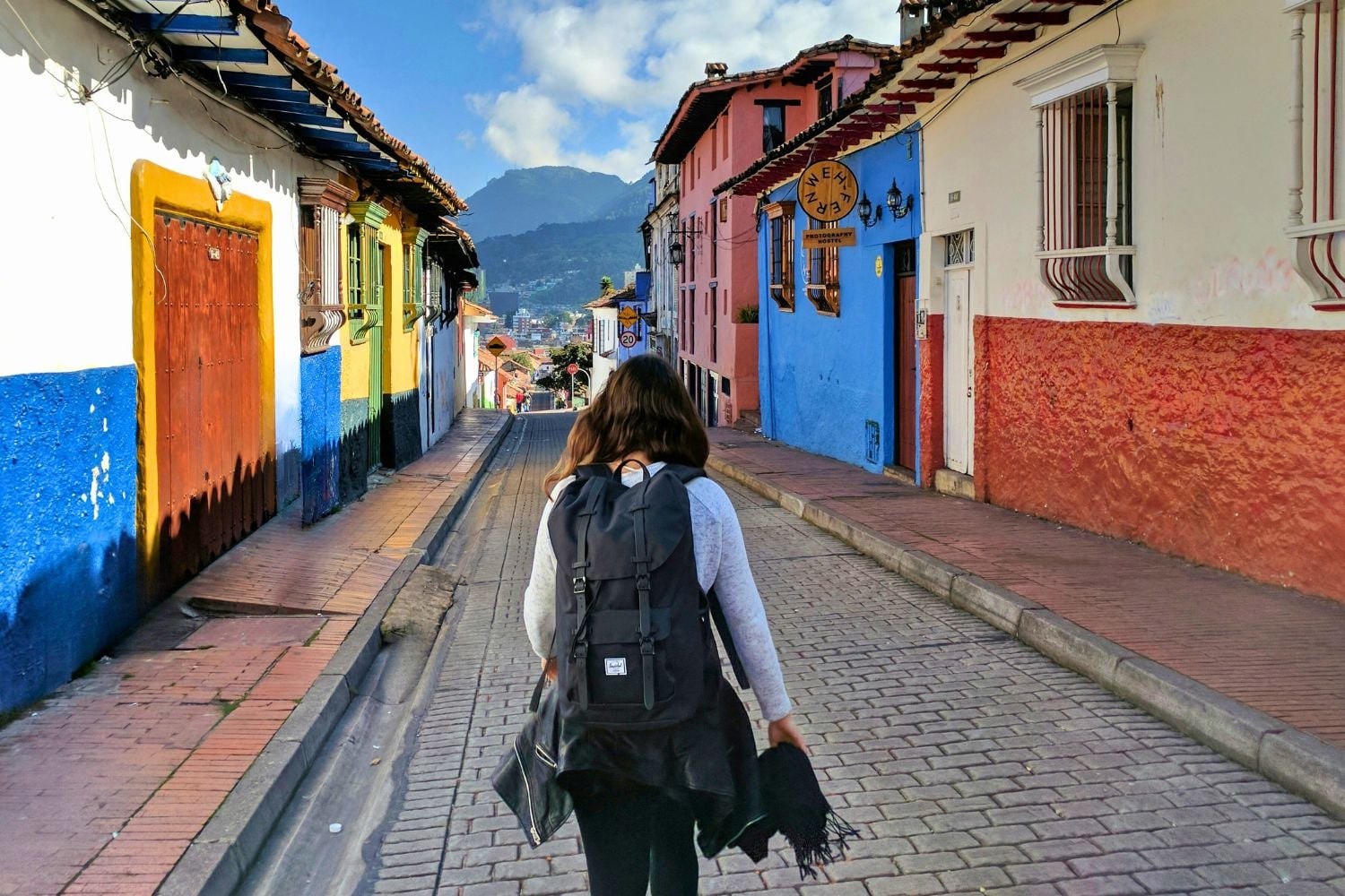 Traveller walking down street in Colombia