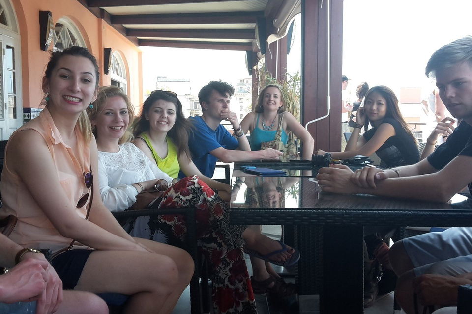 Having dinner with friends in Cuba