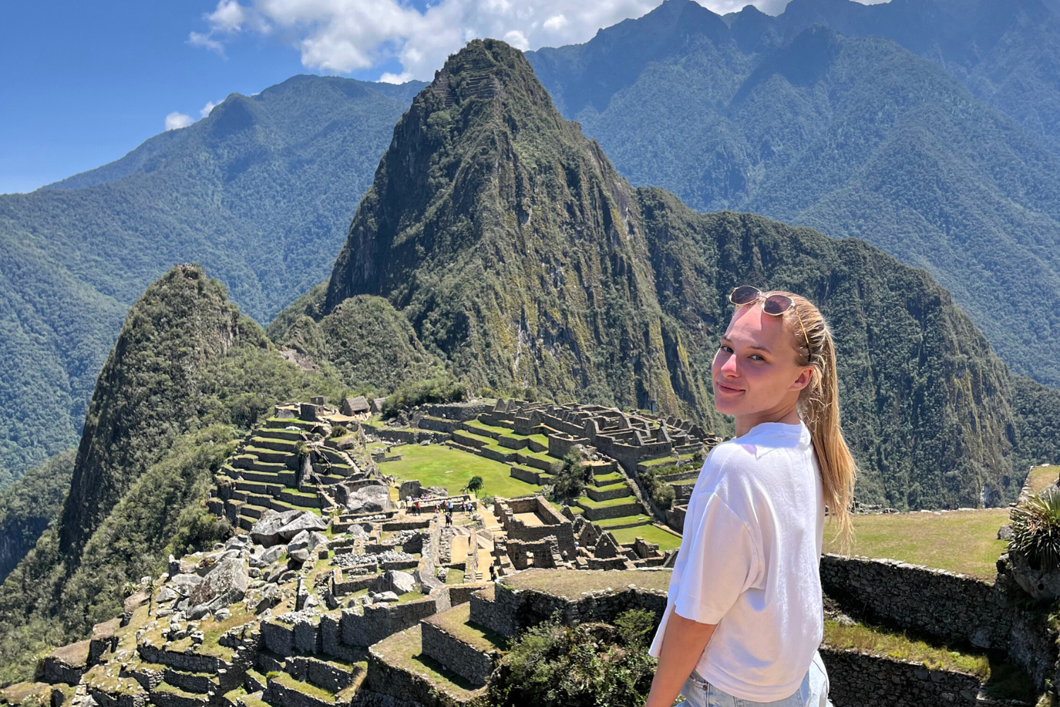 Traveller smiling by Machu Picchu