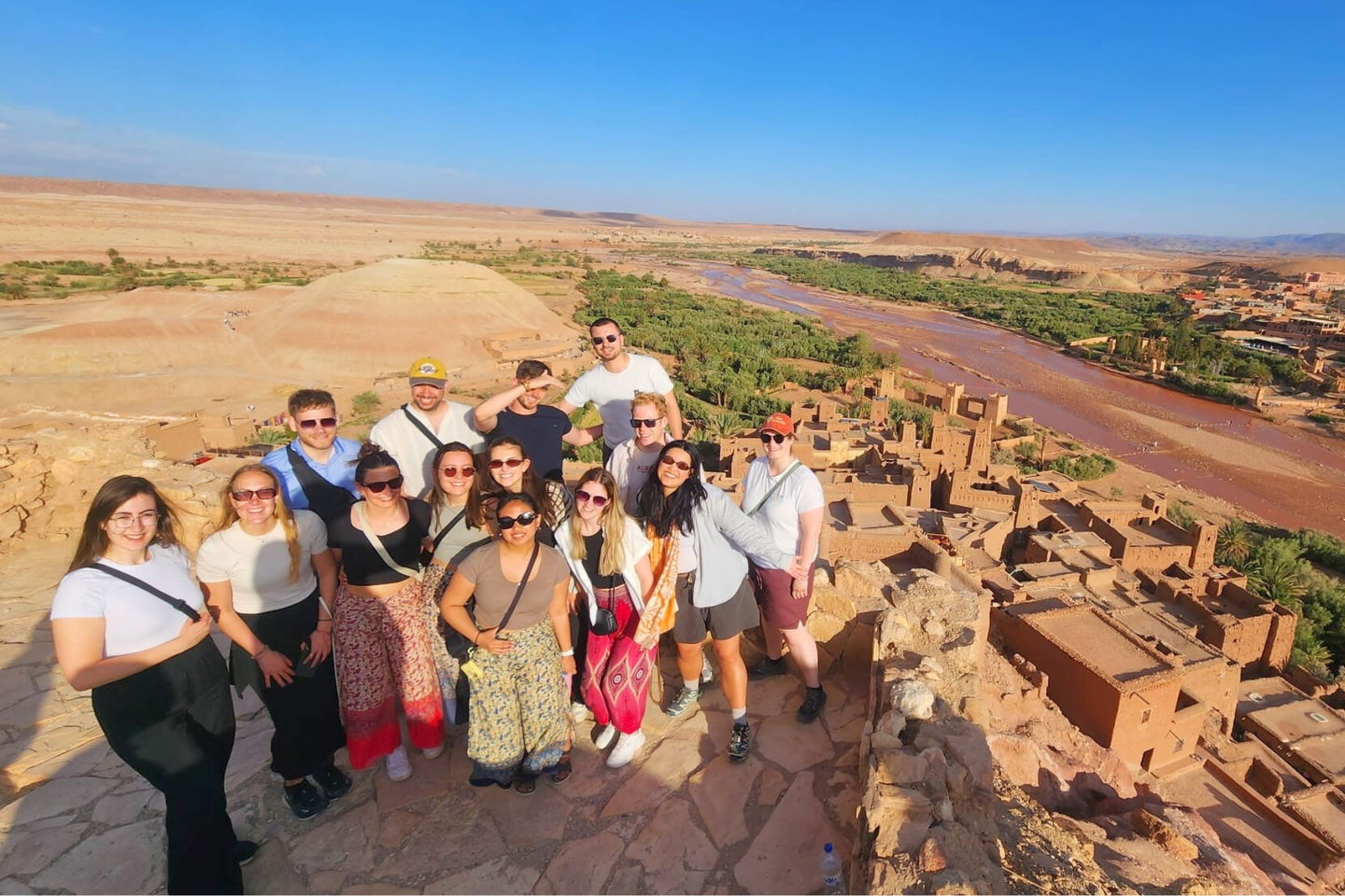 Group photo in front of Ait Ben Haddou kasbah in Morocco