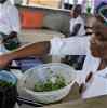 Women making food in Zimbabwe