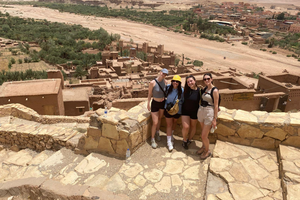 Travellers standing in Ait Ben Haddou in Morocco