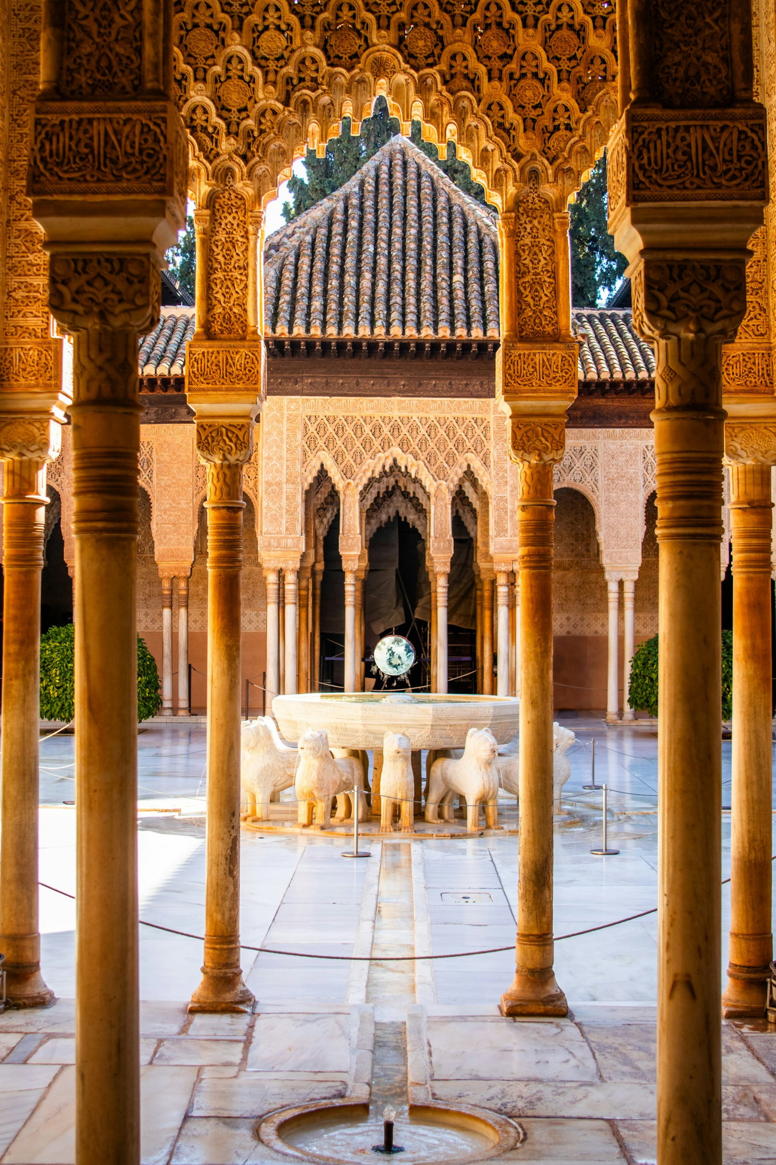 Golden pillars with mosaics, courtyard located in the Alhambra, Granada