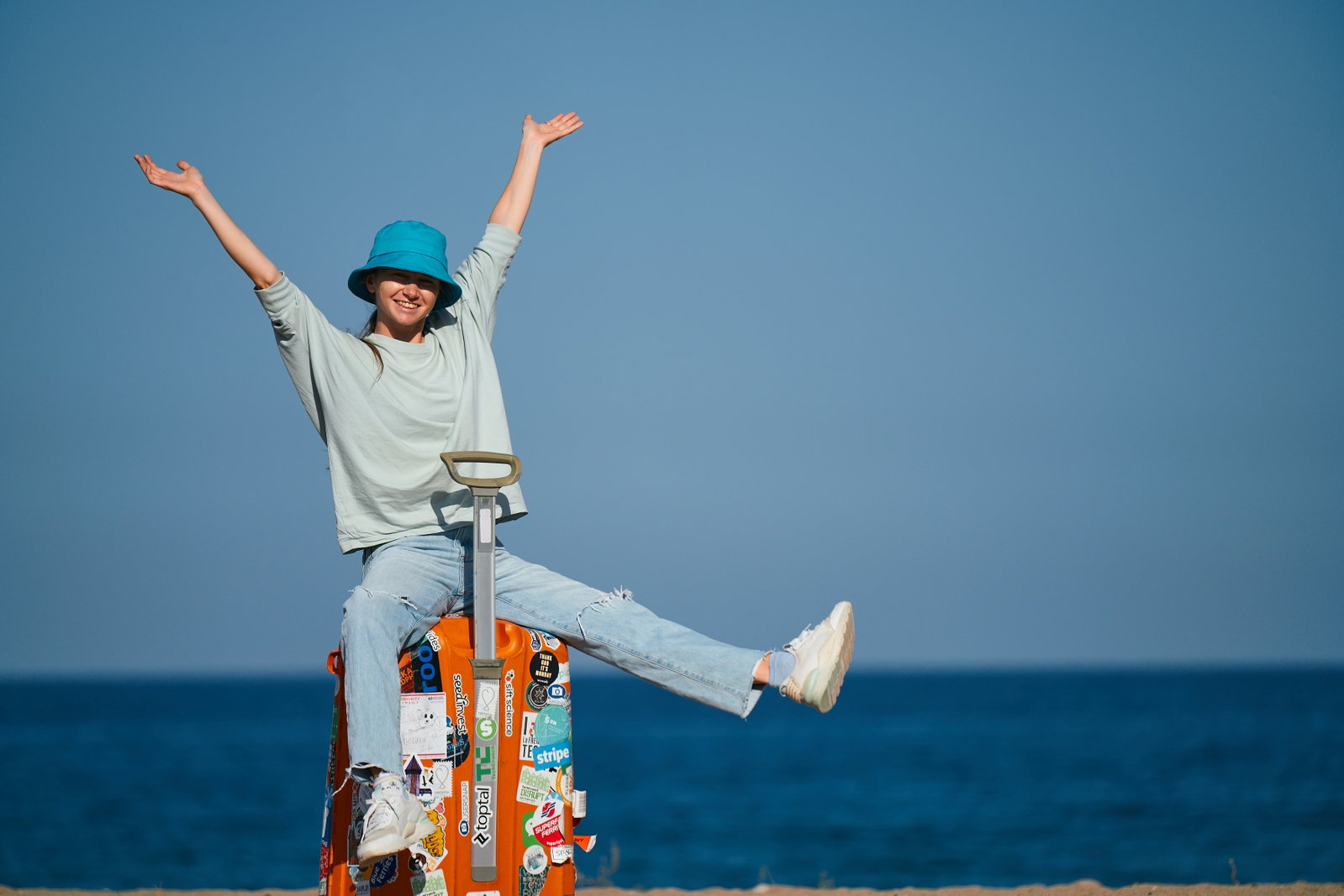 Traveller sat on a suitcase