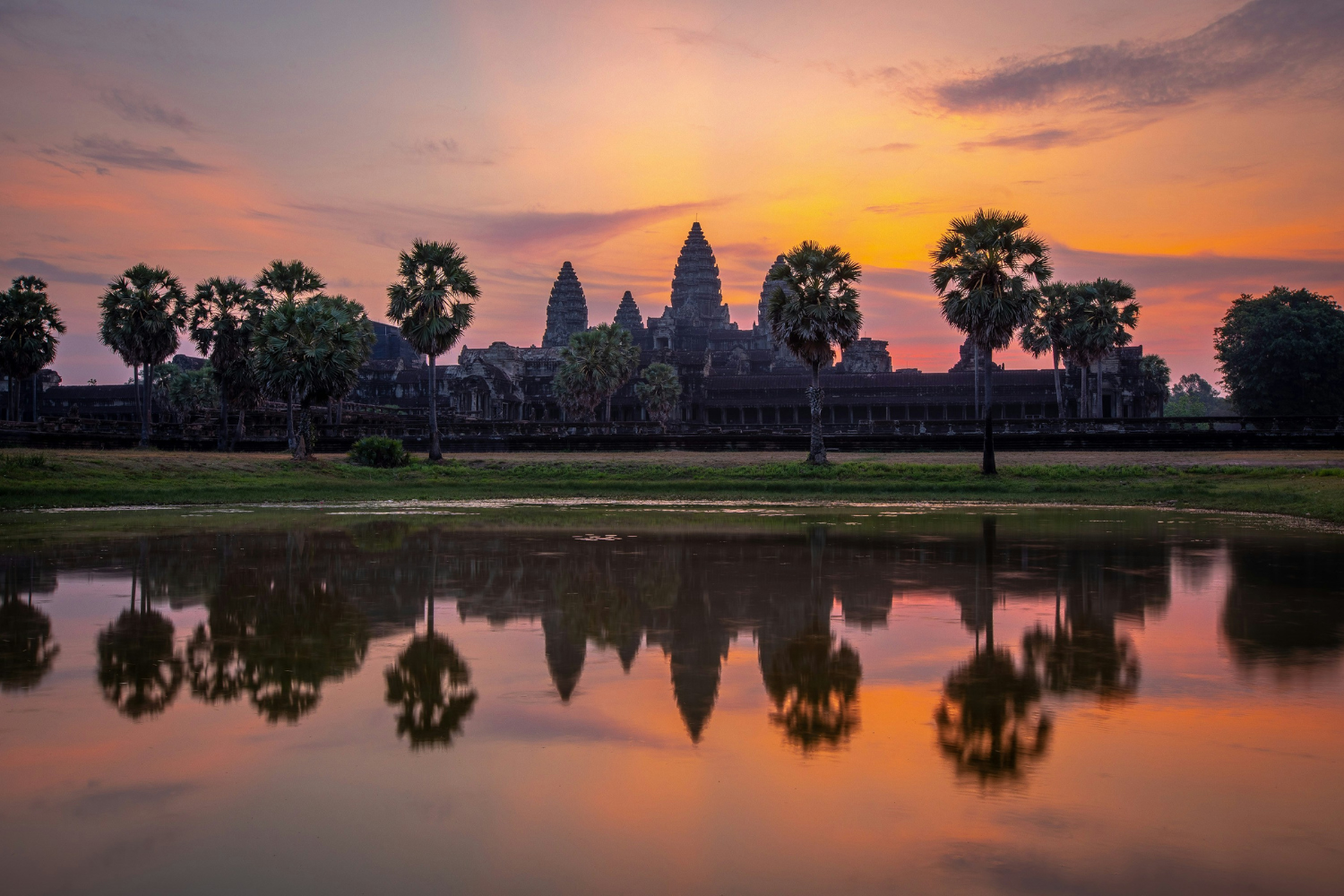 Angkor Wat reflected on the pond at sunrise