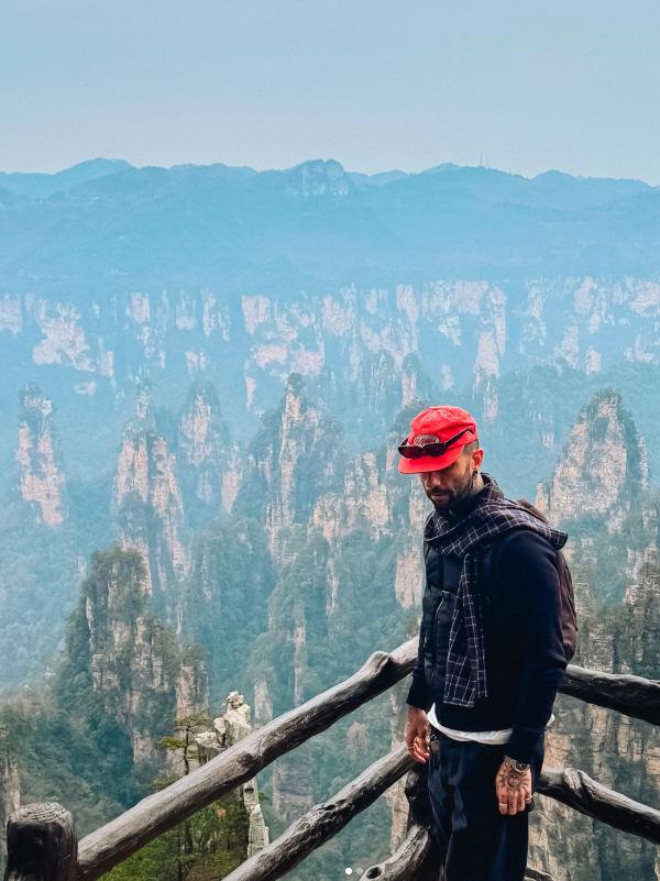 Traveller stoood at Zhangjiajie, also known as the Avatar Mountains, in China