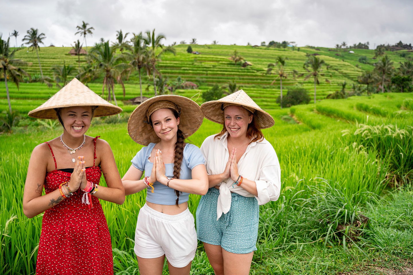 Travellers at Jatiluwih wearing straw hats