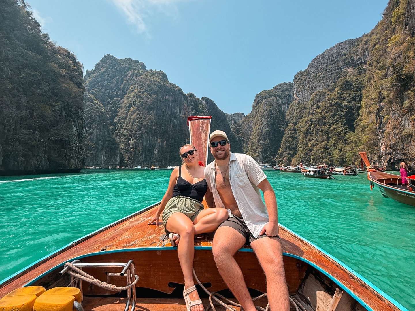 group travellers on long boat in Thailand Koh Phi Phi