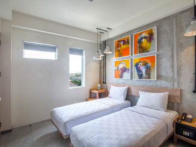 Twin accommodation with beds and hotel room in Canggu Bali, Indonesia