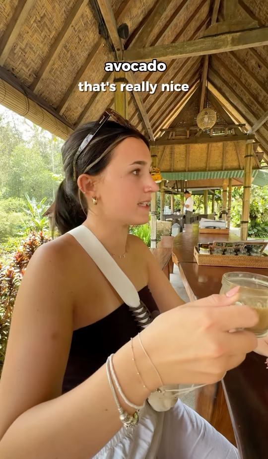 Group travellers trying cat poo coffee in Indonesia Bali. Casey Travel Advisor