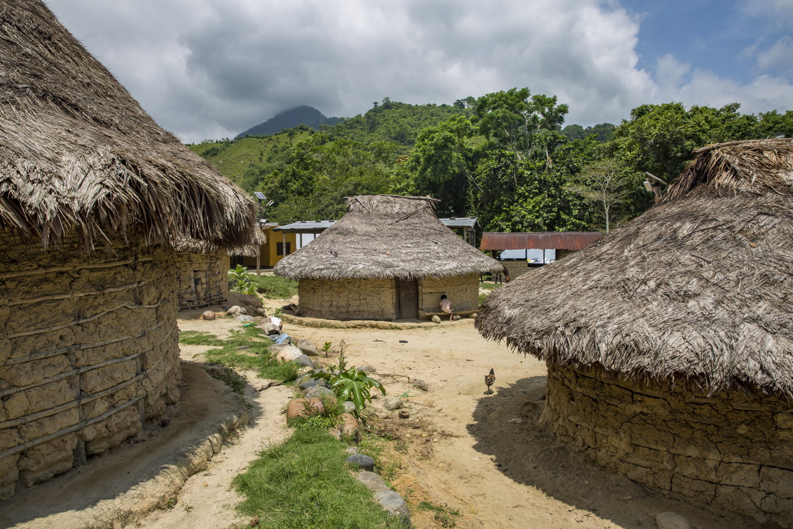 Traditional straw-roofed huts in a Cambodian village