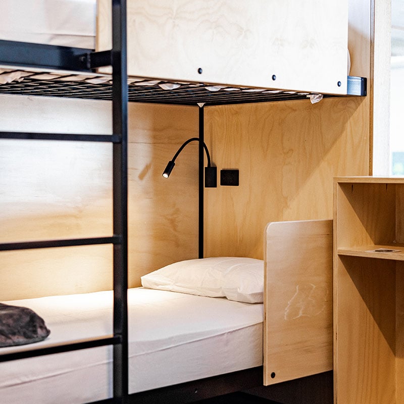 Bed in hostel room