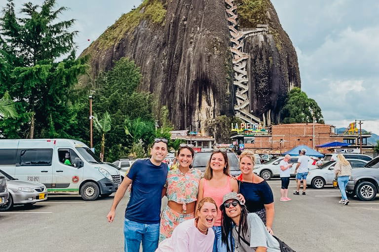 Group with guatape rock