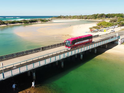 Bus driving over bridge in Australia