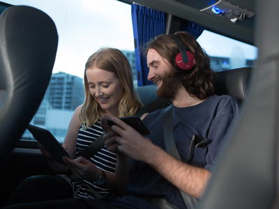 Travellers on coach transport on Australia group tour