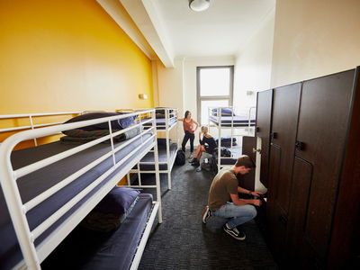 Hostel beds and travellers in Australia
