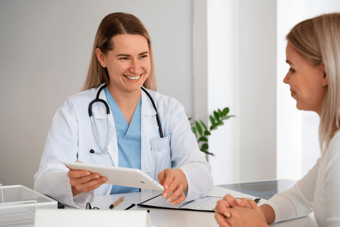 Group traveller talking to doctor about medical advice