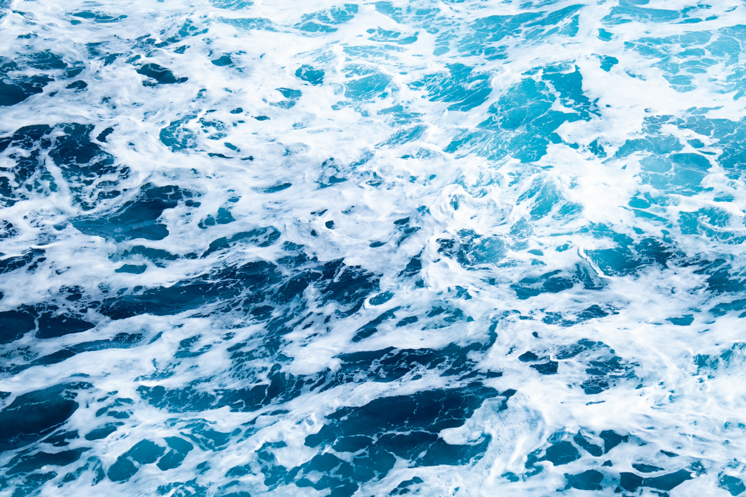 Crashing waves as traveller crosses the drake passage to travel from Ushuaia to Antarctica 