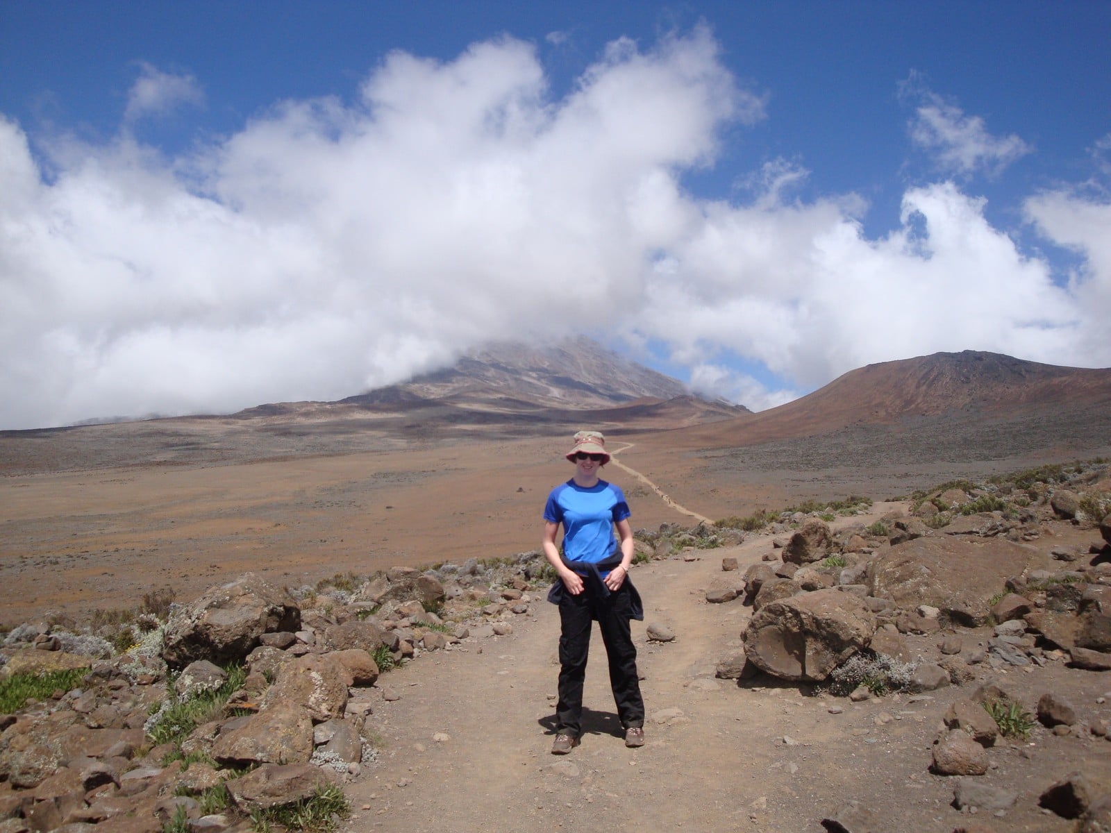 Person climbing Mount Kilimanjaro in Tanzania 