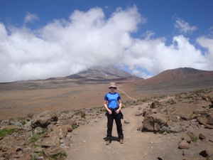 Person climbing Mount Kilimanjaro in Tanzania 