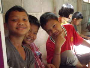 Children in an orphanage posing for a photo