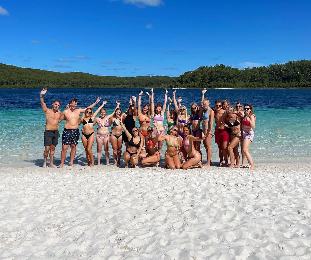 Travellers on beach in Australia