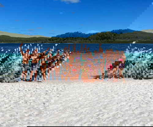 Travellers on beach in Australia