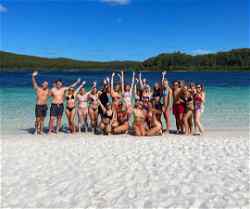 Travellers on beach in Australia