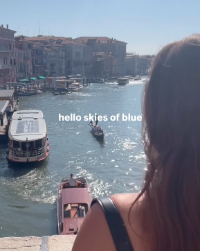 Traveller looking out to Venice canals in Italy
