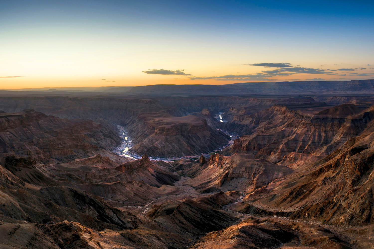 Sun setting over Fish River Canyon in Namibia