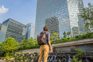 Person looking out to city 
