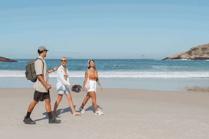 Group travellers on the beach