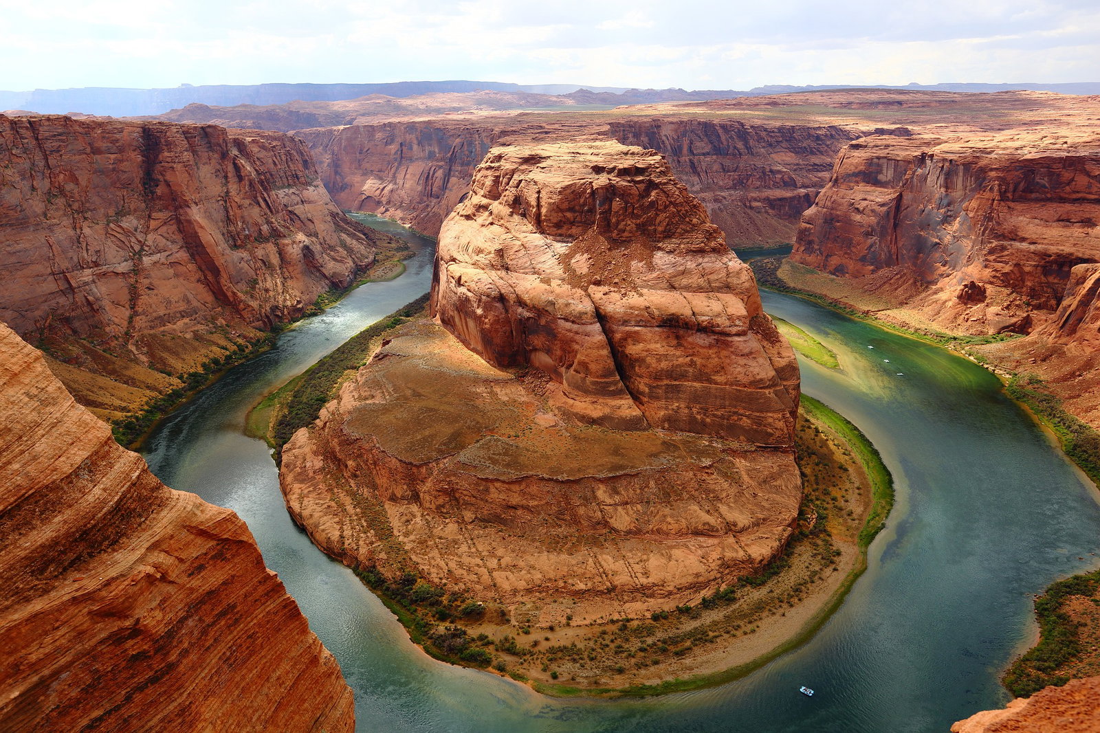 Red rocky canyon with blue and green lake running through each side, Horseshoe Bay, Grand Canyon