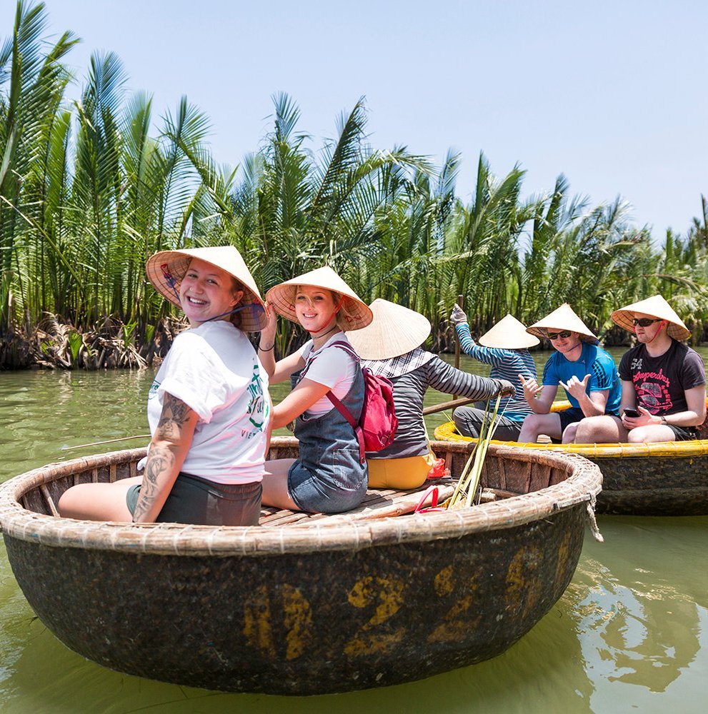 Group travellers on Vietnamese boats in Hoi An
