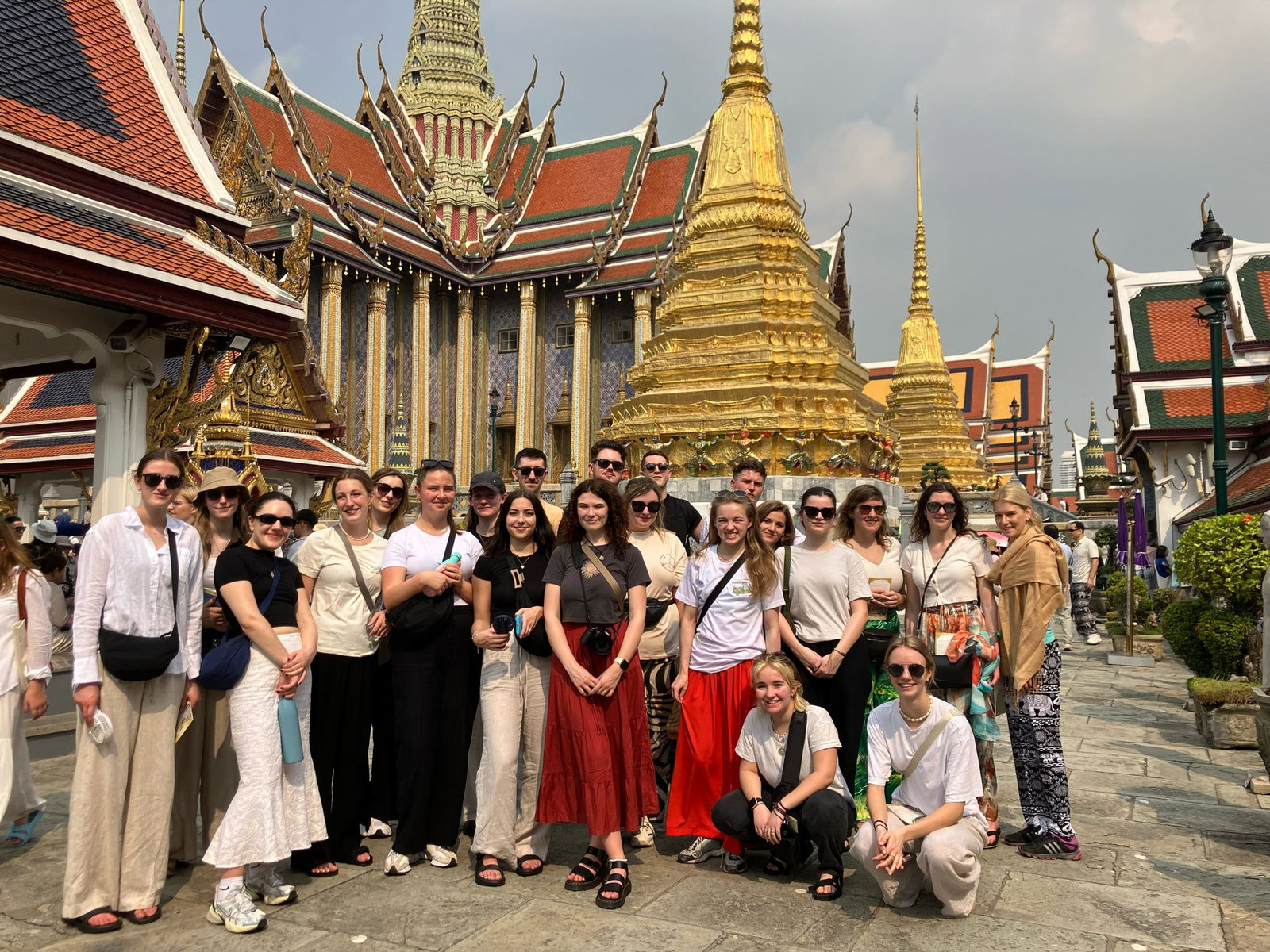 Group travellers at temple in Bangkok Thailand