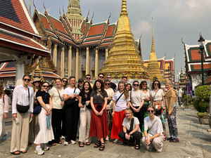 Group travellers at temple in Bangkok Thailand