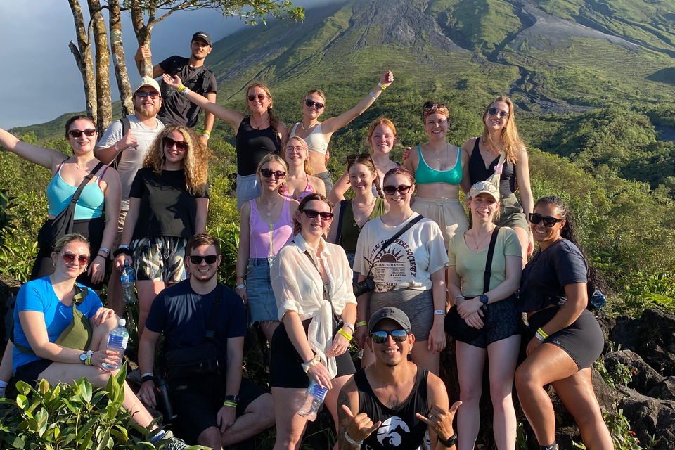 Group of travellers on hike by Arenal Volcano in La Fortuna