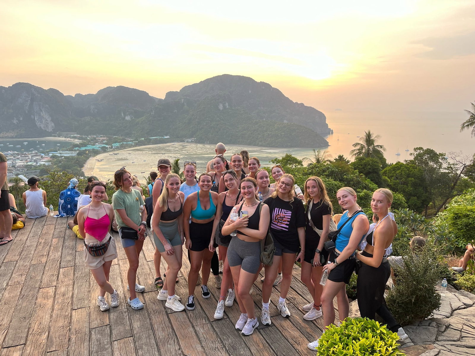 Travellers at Phi Phi viewpoint during sunset