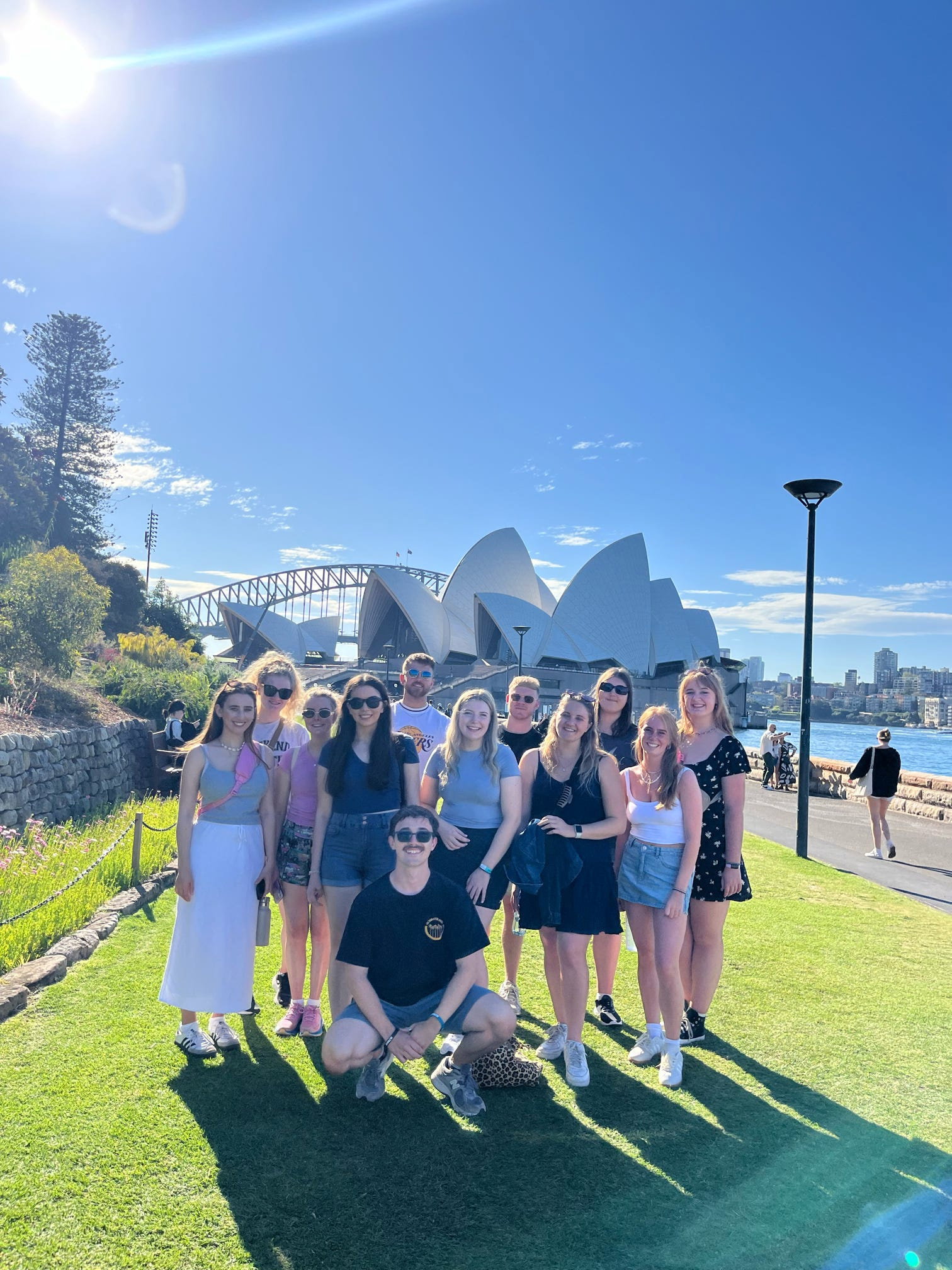 Group of travellers in front of the Sydney Opera House