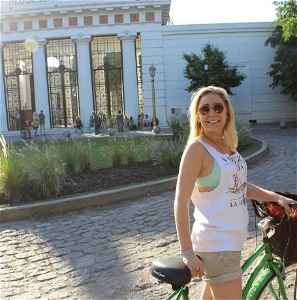 Georgia on a bike in front of Recoleta Cemetery, Buenos Aires