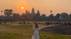Group traveller at Angkor Wat in Siem Reap and sunrise tour